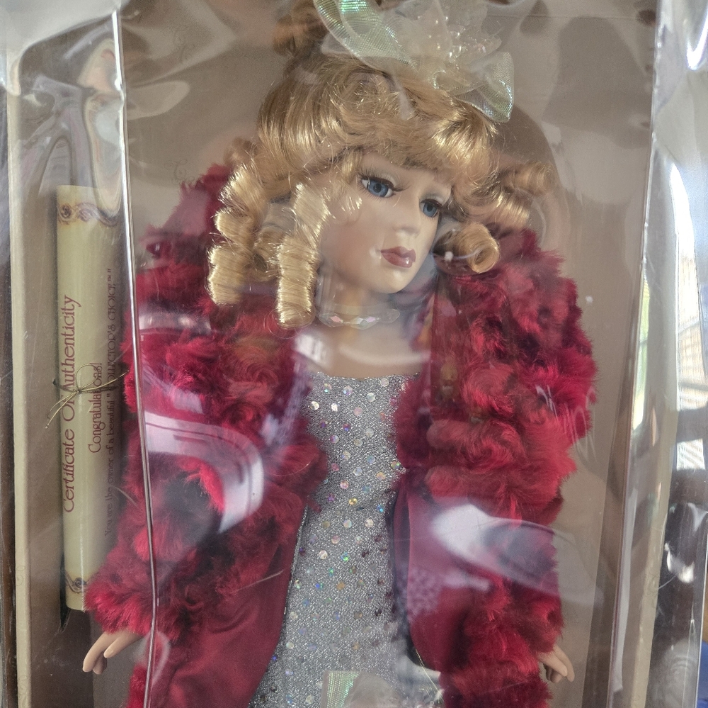 Elegant Red and Silver Collectible Doll